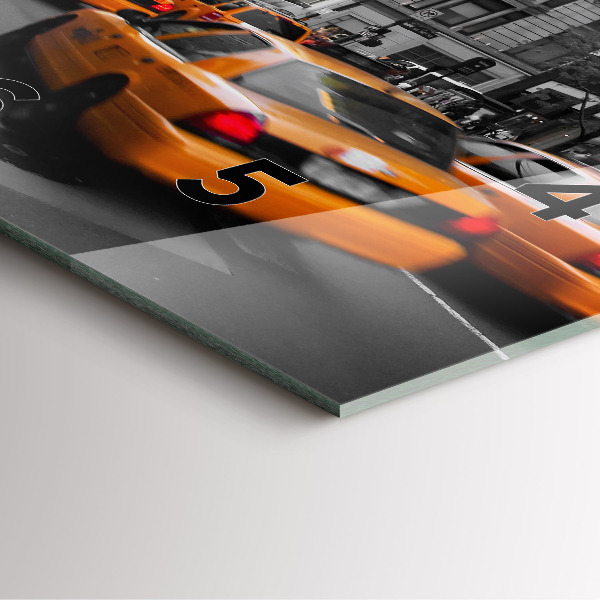 Reloj cuadrado Manhattan y taxis