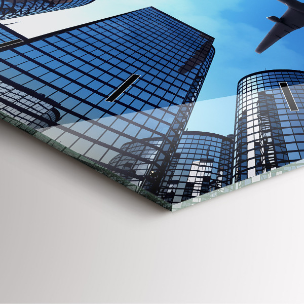 Reloj cuadrado Avión sobre edificios