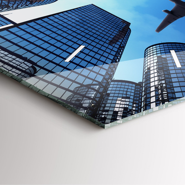 Reloj cuadrado Avión sobre edificios