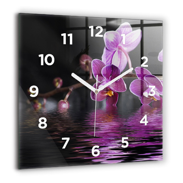 Reloj cuadrado Flor de orquídea sobre el agua