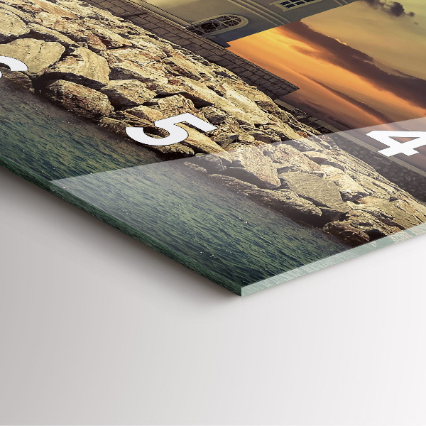 Reloj cuadrado Faro en el mar