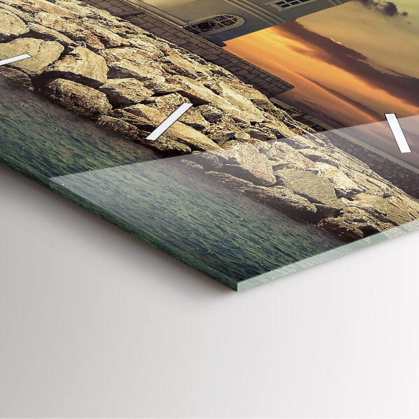 Reloj cuadrado Faro en el mar