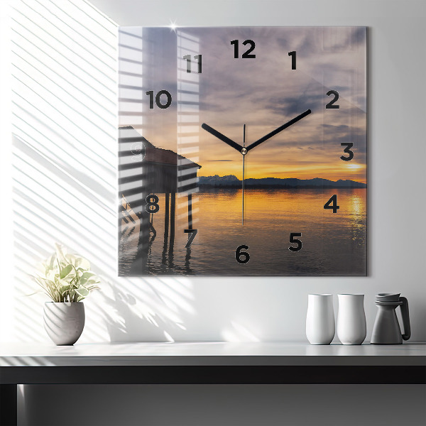 Reloj de pared cuadrado Puesta de sol sobre un lago