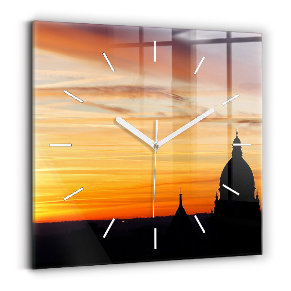 Reloj cuadrado Edificio y puesta de sol