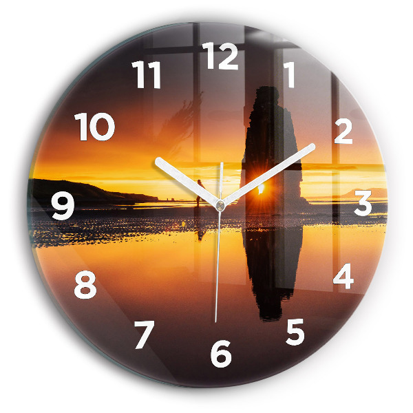 Reloj de cristal redondo Corredor y puesta de sol