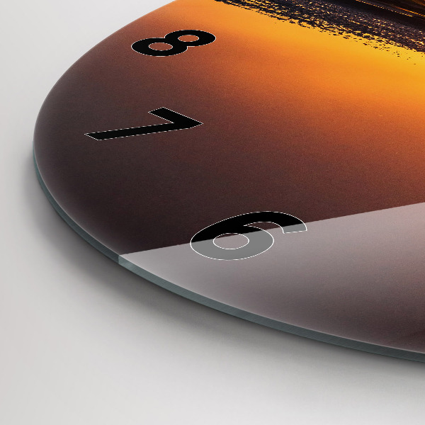 Reloj de cristal redondo Corredor y puesta de sol