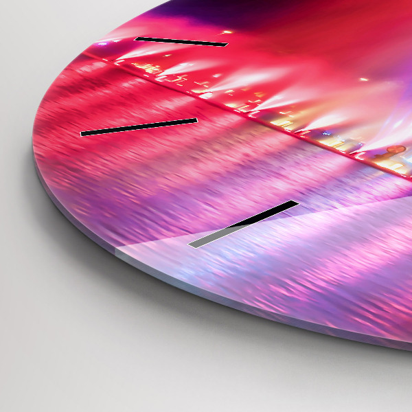 Reloj redondo pared Fuente de Wrocław por la noche