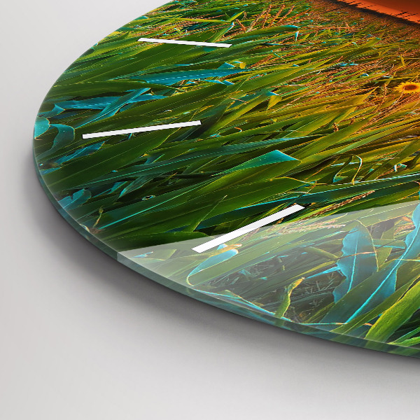 Reloj de cristal redondo Girasoles en un prado