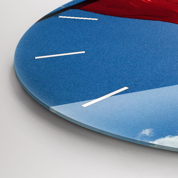 Reloj de pared redondo Bandera polaca contra el cielo