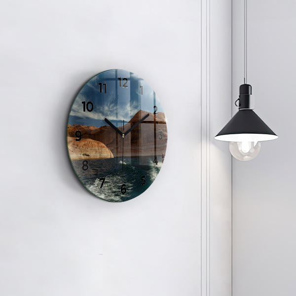 Reloj de pared redondo Persona sobre esquís acuáticos